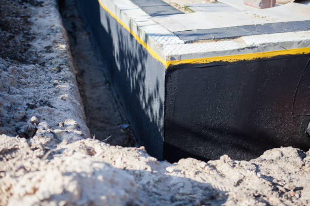 Professional Basement Waterproofing technician working in Hobart, IN